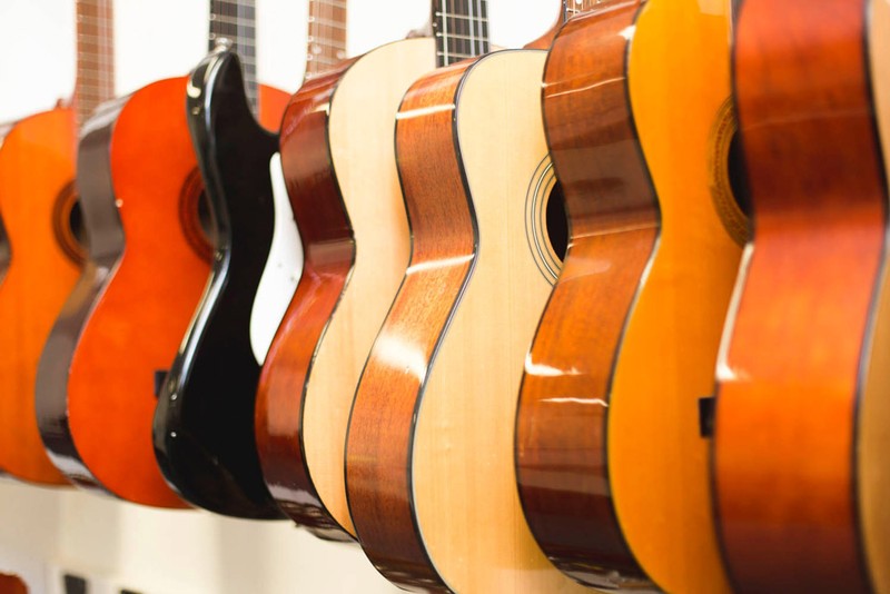 Line of guitars in Medowie Christian school music room