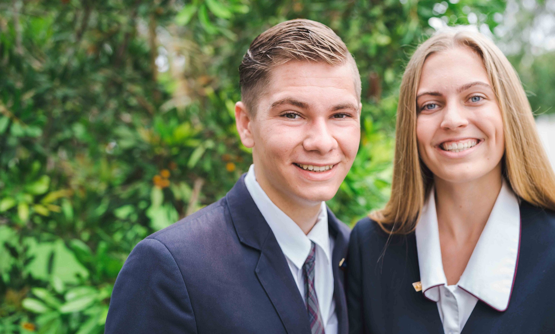 two smiling Christian Secondary School school captains